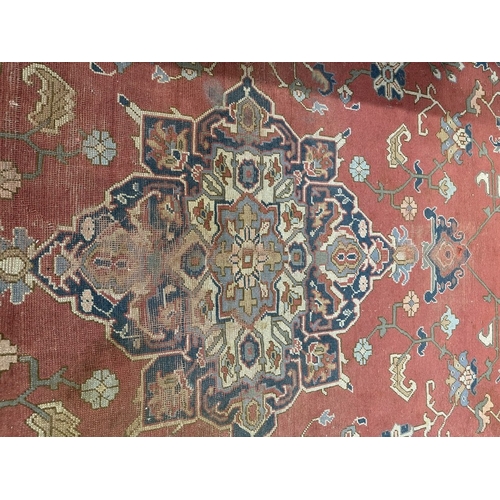 16 - Rugs & Carpets: 19th cent. Iranian Heriz carpet retailed by Maple & Co London (label attached). ... 