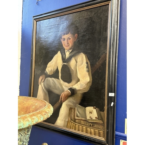 171 - English School: Edwardian oil on canvas of a young boy wearing a sailor suit, black framed. 28ins. x... 