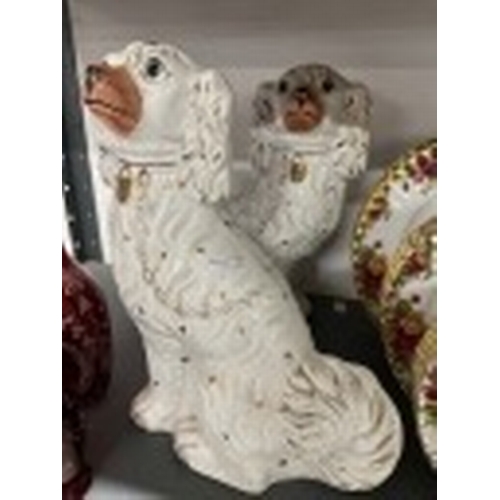 204a - Ceramics: Ceramics: Pair of Victorian Staffordshire pottery Spaniels. 12.7ins. approx.