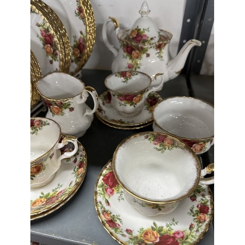 205 - Ceramics: Royal Albert Old Country Roses tea and dinner ware consists of teapot and cover, plates (1... 