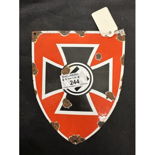 244 - Military: Third Reich red ground enamel plaque shield with iron cross design under a Swastika.Please... 