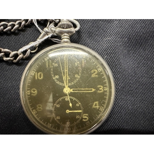 248 - Militaria: German pocket watch black face with yellow numerals and marked with an engraved Nazi Eagl... 