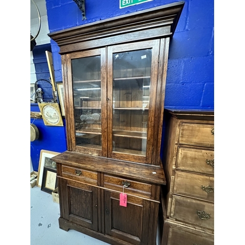 4 - Furniture: Early 20th cent. Mahogany glazed bookcase on base of two drawers over two doors. 80ins. x... 