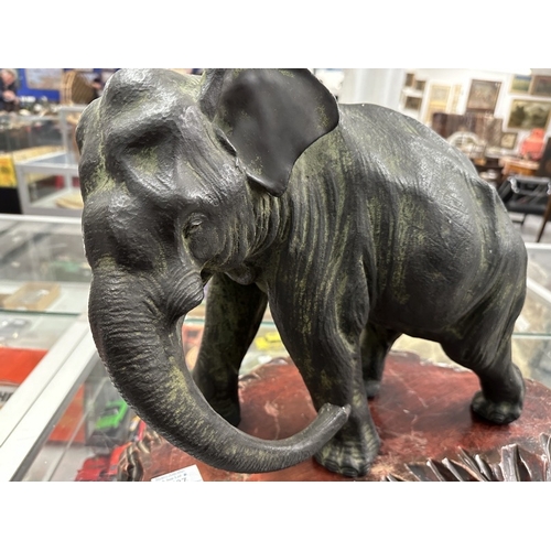 437 - Chinese: Patinated hollow cast bronze elephant with Zhuanshu mark to the underside 39cm. Together wi... 