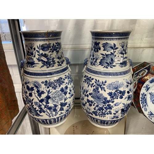 442 - Ceramics: 19th cent. Chinese blue and white vases with Dogs of Fo on the shoulders both A/F with ext... 