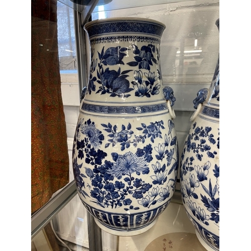 442 - Ceramics: 19th cent. Chinese blue and white vases with Dogs of Fo on the shoulders both A/F with ext... 