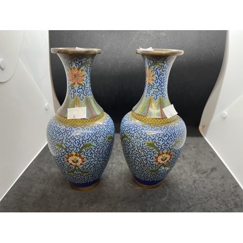 443 - Ceramics: Early 20th cent. Cloisonne vases, blue ground, one with slight damage, matched pair. 9ins.... 