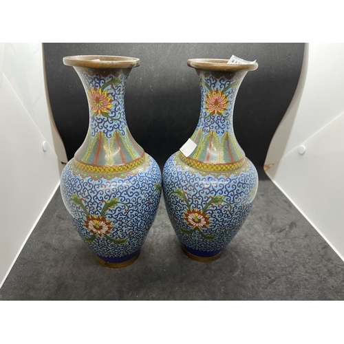 443 - Ceramics: Early 20th cent. Cloisonne vases, blue ground, one with slight damage, matched pair. 9ins.... 