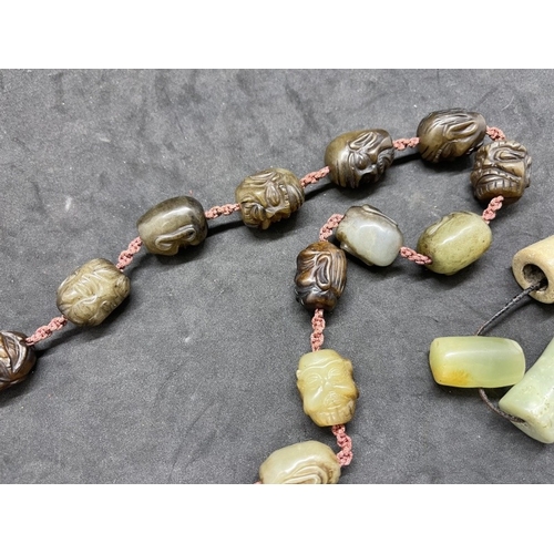 445 - Jewellery: 19th cent. Chinese jade or jadeite court necklace each bead carved as a male head, togeth... 