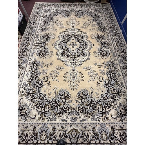 50 - Carpets: 20th cent. English carpet ivory ground with floral decoration in blues, browns, white and i... 