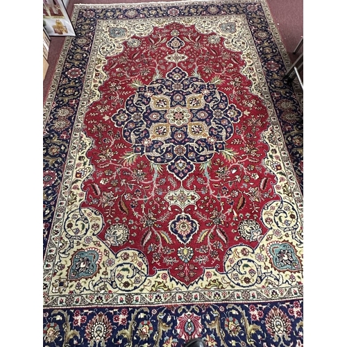 51 - Carpets & Rugs: Early 20th cent. Persian carpet multicoloured ground with floral decoration in reds,... 