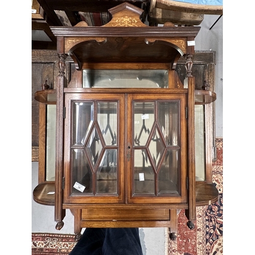 56 - Furniture: Edwardian mahogany wall-hung display cabinet with bevelled glass doors and bevelled mirro... 