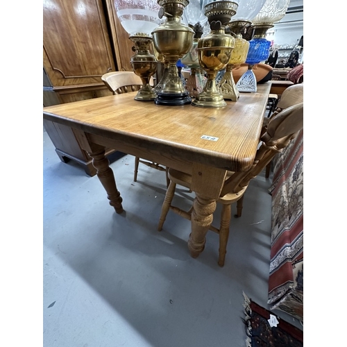 65a - Furniture: 20th cent. Pine kitchen table and four beech chairs. Table measures 71ins. x 29½ins. x 30... 