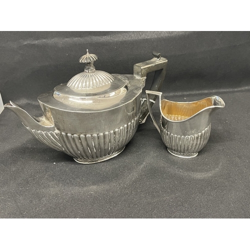 671 - Hallmarked Silver: Hallmarked Silver: Reeded Regency style teapot with ebony handle and finial, plus... 