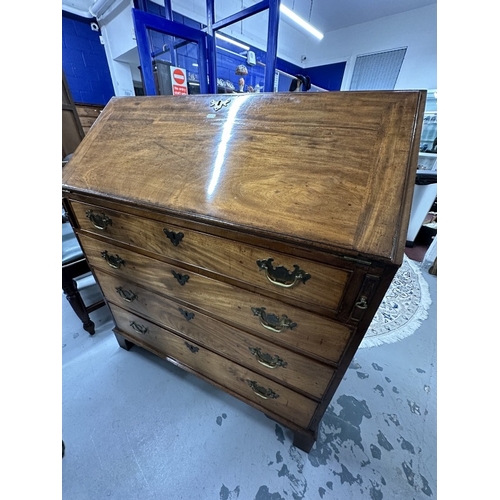 70 - Furniture: 19th cent. Mahogany drop front bureau, four graduated drawers in fitted interior, brass f... 