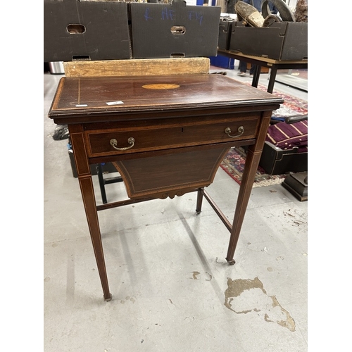 94 - Edwardian Mahogany Games Table Edwardian Regency Revival mahogany games and work table, top opens to... 