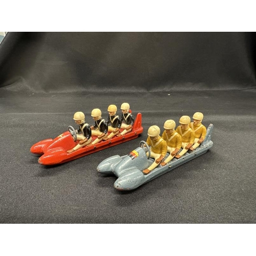 360 - Toys & Games: Two German made Hela-Bob, four 'man' cast iron bobsleighs with four bakelite riders ea... 