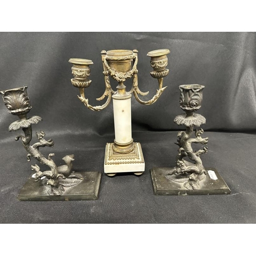 377 - Lighting: Early 19th cent. English pair of bronze stylised candlesticks on chamfered bases with male... 