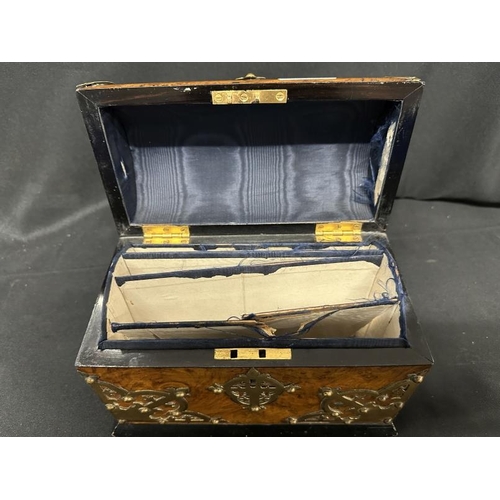 394 - Furniture: Victorian burr walnut domed top stationery box with applied brass decoration in the Gothi... 