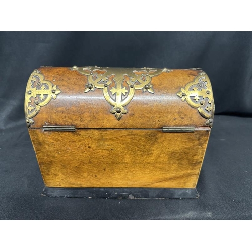 394 - Furniture: Victorian burr walnut domed top stationery box with applied brass decoration in the Gothi... 