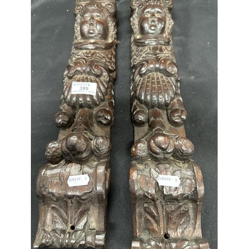 395 - 19th cent: Victorian carvings in the form of cherubs, a pair. 18ins. x 3½ins.