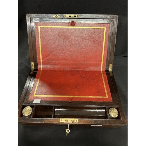 396 - Furniture: 19th cent. Rosewood and brass fitted writing box.