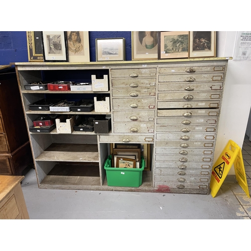 4 - Furniture: 20th cent. Pitch pine workshop storage unit with twenty-three drawers and six storage com... 