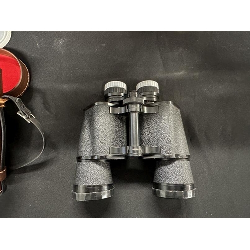 402 - Binoculars: Yashica 10x50 field binoculars in original case together with a mid-century German wall ... 