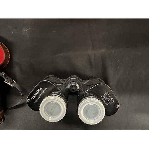 402 - Binoculars: Yashica 10x50 field binoculars in original case together with a mid-century German wall ... 