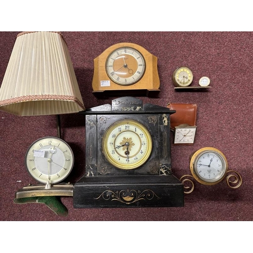 409 - Clocks: Edwardian slate mantel clock and six other small clocks, including Estyma, Smiths and Pifco ... 