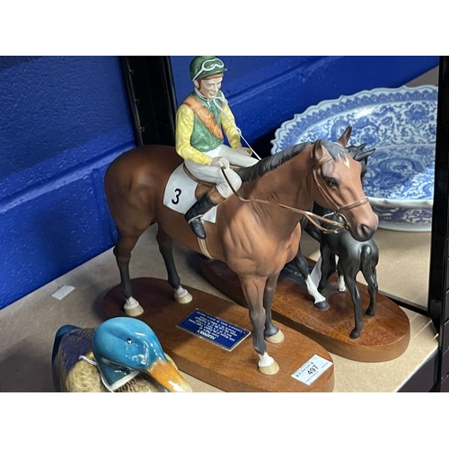 497 - Ceramics: Beswick model of Nijinsky with Lester Piggott, Black Beauty and Foal, both with oak plinth... 