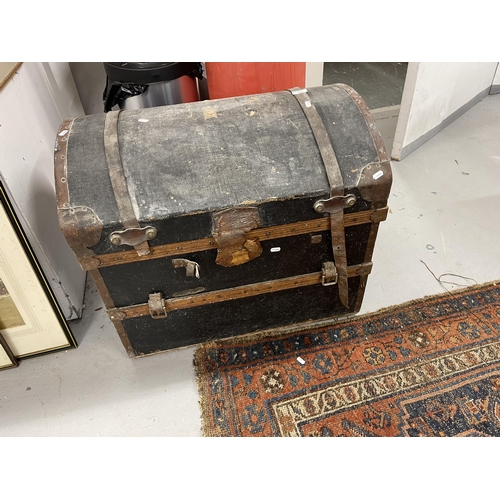 51 - Travel Trunk: Edwardian dome top canvas travelling trunk with leather handles, copper bound. 75cm lo... 