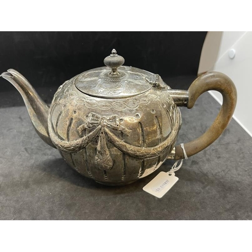 522 - Hallmarked Silver: Victorian silver bullet teapot, London 1876, decorated with ribbons and swags. 17... 