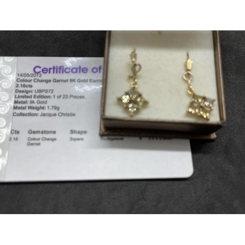 598 - Jewellery: Boxed pair of 9ct gold and garnet colour change square drop earrings, with certificate. 2... 