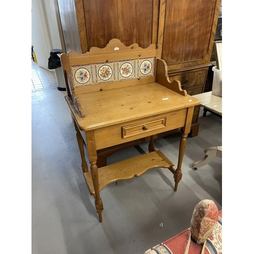 61 - 20th cent. Furniture: Pine French washstand of small proportions with tiled gallery on turned suppor... 