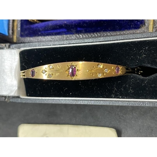 613 - Hallmarked Jewellery: 9K gold hinged bangles one set with diamond and sapphire the other set with am... 