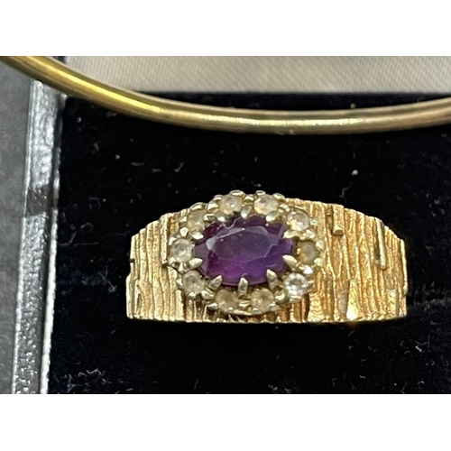 614 - Hallmarked Jewellery: 9ct gold and amethyst ring with bark effect decoration, together with another ... 