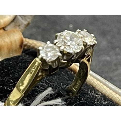 637 - Hallmarked Jewellery: 18ct yellow gold three stone diamond ring, total diamond weight 0.6ct.... 