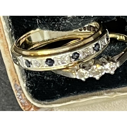 639 - Hallmarked Jewellery: 9ct yellow gold trilogy ring set with three small diamonds, 2g. Together witha... 