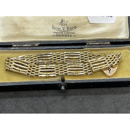 645 - Jewellery: 9ct gold curb link bracelet with heart padlock, only marked 9ct but tested, 11.3g. Pus a ... 