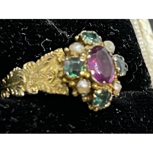 663 - Jewellery: Mid-Victorian 9ct gold ring in a Georgian style, a central amethyst within a border of se... 