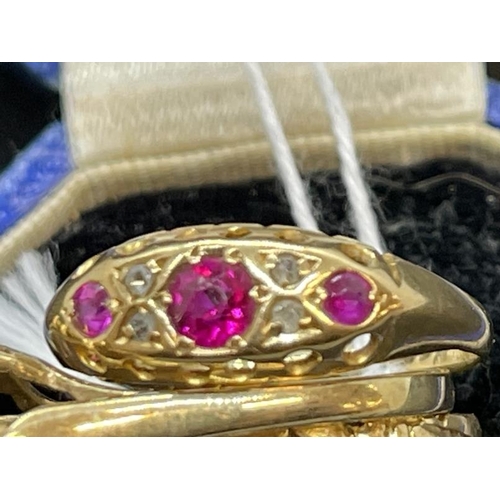 665 - Jewellery: 9ct yellow gold ring set with three opals within a frame of twelve garnets, 3.1g, and two... 