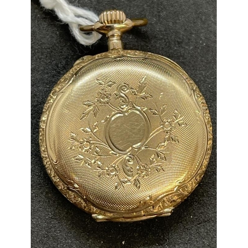 689 - Watches: Ladies 14K gold pendant watch c1900-1920, white enamel dial 23mm across, stamped O, 585.... 