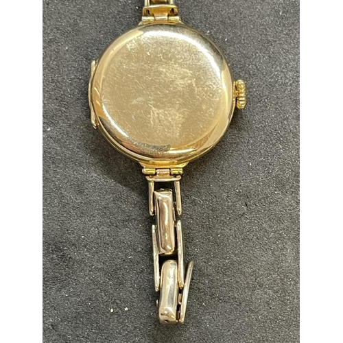 693 - Watches: Ladies hallmarked 9ct gold watch by Cudos, Birmingham 1919, with original expanding 9ct gol... 