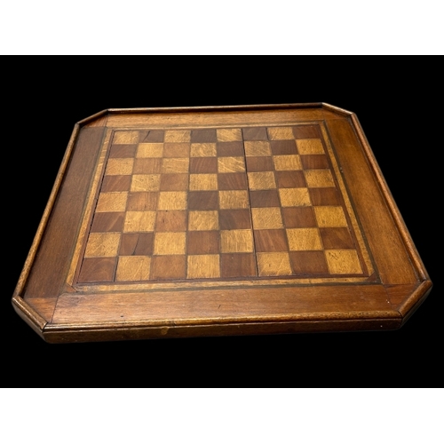 257 - R.M.S. TITANIC: An exceptional oak chessboard made from Titanic wreck wood by William Parker, a Nova... 