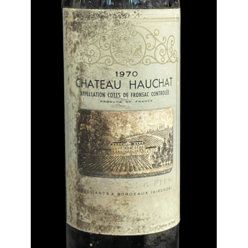 480 - Wines: Chateau Hauchat Bordeaux 1970, appellation Cotes de Fronsac Controlle with paper labels and s... 