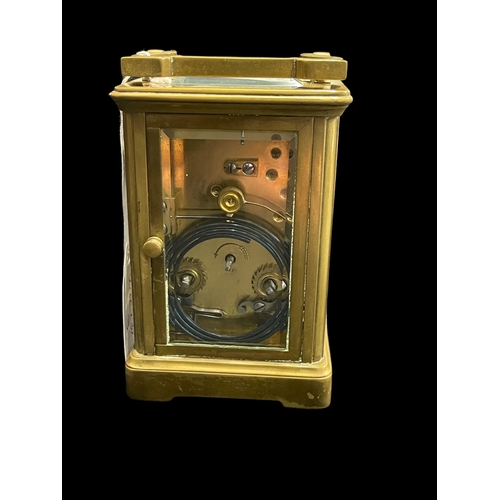 498 - Clocks: Late 19th cent. French striking carriage clock, enamelled face, Roman numerals, bevelled gla... 