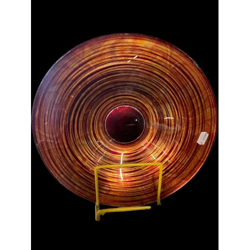 509 - Curios: Red and orange art glass bowl, a doll's seat made from a port barrel and two Eastern framed ... 