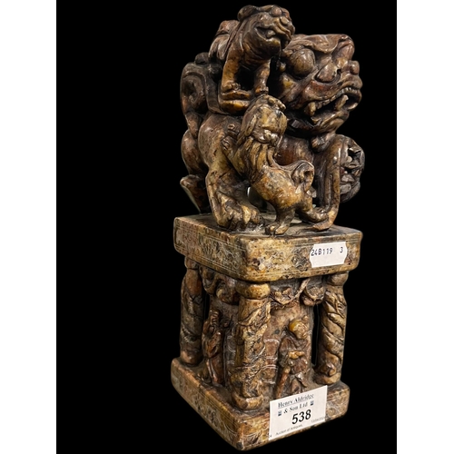 538 - Chinese: Large Chinese soapstone seal carved with fo dogs above a temple pillar flanked by figures, ... 