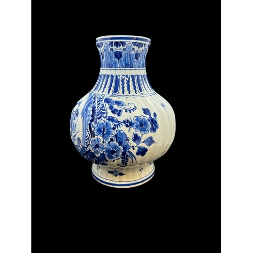 590 - European Ceramics: Dutch Delft ribbed bulbous vase painted with birds and flowers, remains of a reta... 